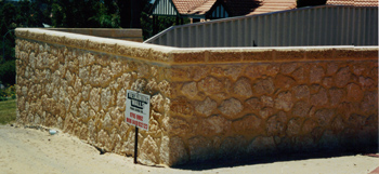 Natural limestone rock wall